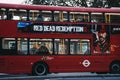 Red Dead Redemption 2 game advertisement on a red double decker