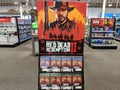 Red Dead Redemption 2 Video game display for Xbox One and PS4 inside a Best Buy