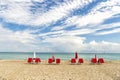 Red deck chairs in South beach