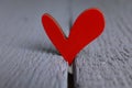 Red decorative heart on grey wooden table, closeup Royalty Free Stock Photo