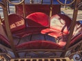 Red decorative leather carriage seat. Street photo zone. Decorative vintage element Royalty Free Stock Photo