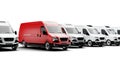 Red delivery van leading row of white vans isolated Royalty Free Stock Photo