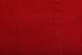 Red denim jeans texture close up. Red denim jeans background Royalty Free Stock Photo