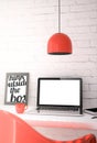 Red desktop with blank screen laptop Royalty Free Stock Photo