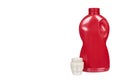 Red detergent bottle, liquid washing soap for textile. Isolated