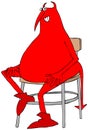Red devil sitting on a stool