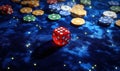 Red dice on blue felt with poker chips scattered Royalty Free Stock Photo