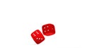 Red dice at different angles on a white background Royalty Free Stock Photo