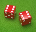 Red dice on green cloth