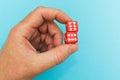 Red dice in hand, good luck Royalty Free Stock Photo