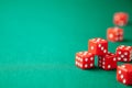 Red dices on green poker gaming table in casino. Concept online gambling. Copy space for text Royalty Free Stock Photo