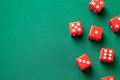 Red dices on green poker gaming table in casino. Concept online gambling. Copy space for text Royalty Free Stock Photo