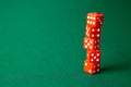 Red dices on green poker gaming table in casino. Concept online gambling. Copy space for text Royalty Free Stock Photo