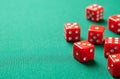 Red dices on green poker gaming table in casino. Concept online gambling. Copy space for text Royalty Free Stock Photo