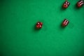 Red dices on green poker table Royalty Free Stock Photo