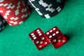 Red dices and poker chips Royalty Free Stock Photo