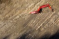 Red digger in stone-pit Royalty Free Stock Photo