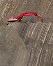 Red digger in stone-pit Royalty Free Stock Photo