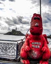 Red dinosaur in Mumbles pier in Swansea, United Kingdom Royalty Free Stock Photo