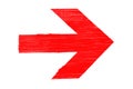 Red directional arrow manually painted on wooden signboard texture
