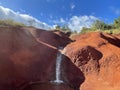 Red Dirt Waterfall off Waimea Canyon Drive on Kauai Island in Hawaii Royalty Free Stock Photo