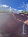 Red Dirt Waterfall off Waimea Canyon Drive on Kauai Island in Hawaii Royalty Free Stock Photo