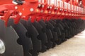 Red Disc Harrow Trailer for a Farming Tractor