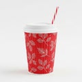 Red disposable coffee cup with leaf pattern isolated on white background Royalty Free Stock Photo