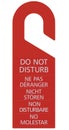 Red Do Not Disturb Door Handle Cardboard Tag, Vertical Isolated Hanger Sign Macro Closeup, English, French, German, Italian