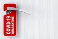 Red Do Not Disturb Door Label with COVID-19 Quarantine Sign on a Hotel, Home or Room Door Handle. 3d Rendering