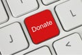 Red donate button on the keyboard Royalty Free Stock Photo