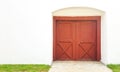 Red entrance door on a white fence Royalty Free Stock Photo