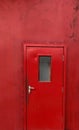 Red door in the building Royalty Free Stock Photo