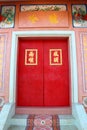 Red door in Chinese shrine Royalty Free Stock Photo