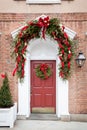 Red Door with Christmas Wreath