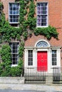 A red door in Dublin, Ireland. Arched Georgian door house front Royalty Free Stock Photo