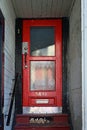 Red door in Fan Tan Alley in Chinatown in Victoria, British Columbia, Canada. Royalty Free Stock Photo