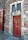 Red Door and Gable Stone for the Blacksmith`s Guild, Waag House, Amsterdam, The Netherlands