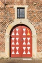 Red door of the historic castle in Raesfeld Royalty Free Stock Photo