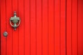 Vintage red door and brass knob in Italy Royalty Free Stock Photo