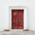 Serene Minimalism: Red Wooden Door In Greek Building