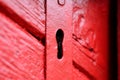 Red door with old key hole Royalty Free Stock Photo