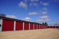 Red door storage units being used by the community Royalty Free Stock Photo