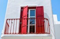 Red doors, typical of a house on the island of Myconos, Greece Royalty Free Stock Photo