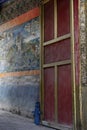 A red doorway brightens the Pelkor Chode Monastery in Gyantse