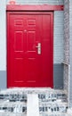 Red doorway in a street in Beijing, China