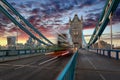 Red double decker bus crossing the Tower Bridge in London Royalty Free Stock Photo