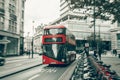 Red double decker bus in motion blur