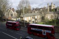 Red double decker buses london palace