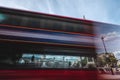 Red Double Decker busses passing the Trafalgar Square in front of the Nelson column Royalty Free Stock Photo